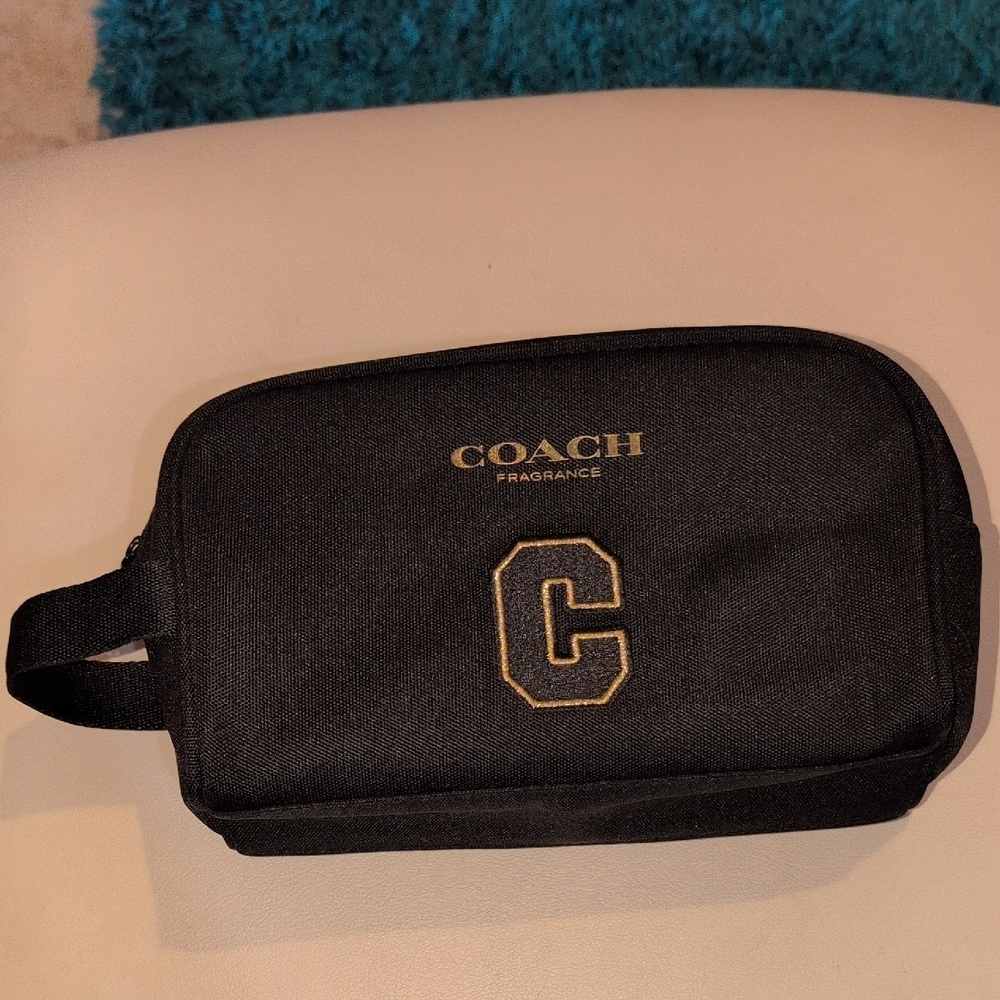 Coach Black and Gold Toiletry Bag